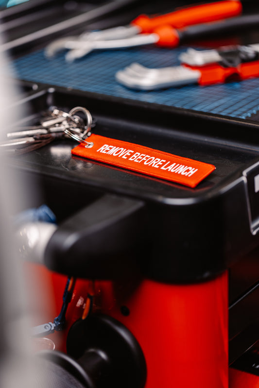 Keychain "REMOVE BEFORE LAUNCH"